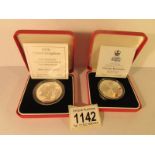 A 1947 - 1997 silver proof £5 mint coin and a 996 commemorative silver proof coin,