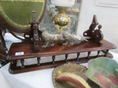 A mahogany wall shelf