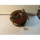 A mahogany fishing reel