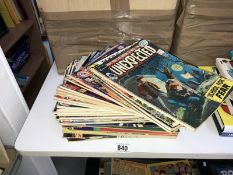A collection of DC and Charlton Horror and Cowboy comics