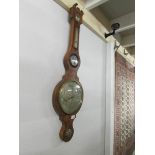 A mahogany banjo barometer.