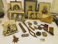 A collection of WW2 medals, photographs etc.