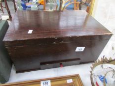 A mahogany box with drawer