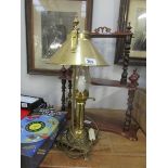 A brass table lamp