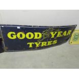 A large Goodyear enamel sign.