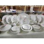 59 pieces of Royal Doulton Pillar Rose pattern table ware including casserole dishes,