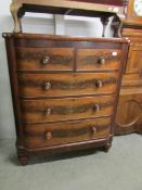 A Victorian mahogany 2 over 3 chest of drawers with mother of pearl inlaid handles.