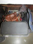 a box of camera bags etc., including Contax camera, other camera's and accessories.