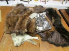 6 vintage fur stoles in various designs and additional fur pieces.