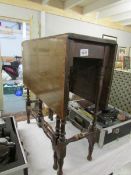 A small Edwardian mahogany inlaid drop leaf table