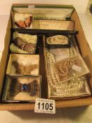 A mixed lot of old costume jewellery including silver filigree brooch,