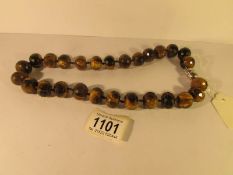 A necklace of natural tiger's eye beads
