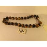 A necklace of natural tiger's eye beads