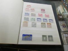 3 albums of stamps