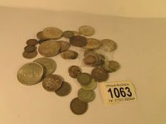Approximately 21 grams of pre 1920 silver coins and approximately 176 grams of pre 1947 silver