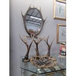 An antler style framed mirror and 4 other antler style items