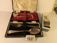 A cased silver spoon & fork,