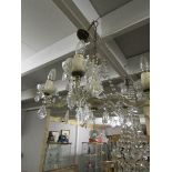 A 5 lamp glass chandelier