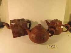 3 Yixing earthenware teapots all with seals to base.