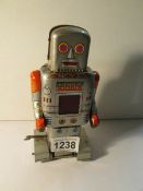 A Japanese tin plate clockwork robot by 'SY'