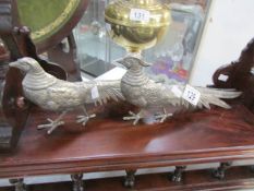 A pair of silver plated pheasants