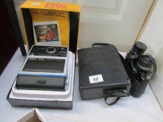 A boxed Kodak Ek6 instant camera and cased Tasco binoculars