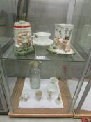 A mixed lot of china including crested ware, advertising jug, pigs etc and a soda syphon.