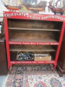 A painted chocolate advertising cabinet