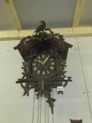 A cuckoo and quail 3 weight clock (cuckoo in the hour,