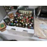 An assortment of spirit miniatures including Whisky, Gin, Brandy,