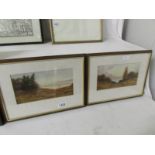 A pair of framed and glazed watercolour lake scenes signed R Stafford.