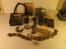 A mixed lot including EPNS clutch bag, silver book mark, mourning watch chain, mourning brooch,