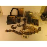 A mixed lot including EPNS clutch bag, silver book mark, mourning watch chain, mourning brooch,