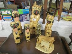 3 wooden dogs, 2 wooden cats,