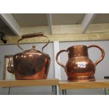 A copper kettle and a 2 handled copper pot