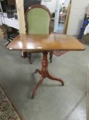 A Victorian mahogany tip top table.