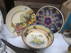 A Royal Doulton bowl a/f. and 2 Royal Doulton plates.