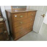 An oak 2 over 3 chest of drawers