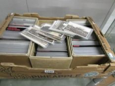 A tray containing 3 boxes of postcards including Channel Islands, Scotland, Derbyshire,