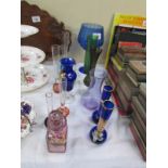 A mixed lot of coloured glass vases