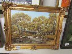 An oil on board entitled 'Autumn on the Artra' by T. Heathcote.