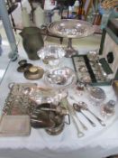 A mixed lot of vintage silver plate including jug, comport,