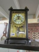 An 8 day mantel clock by Ansonia Clock Co.