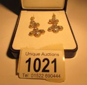 A Pair of 9ct gold earrings