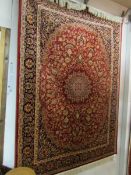 A Keshan rug,