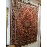 A Keshan rug,