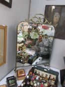 A brass fire screen inset hand painted mirror