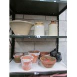 2 shelves of plant pots, stone ware etc.