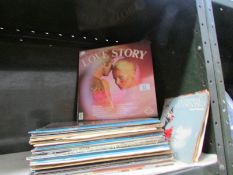 A mixed lot of 45 rpm and LP records.