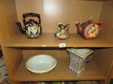 An oriental blue & white vase, a jug, a bowl a/f and 2 oriental teapots.